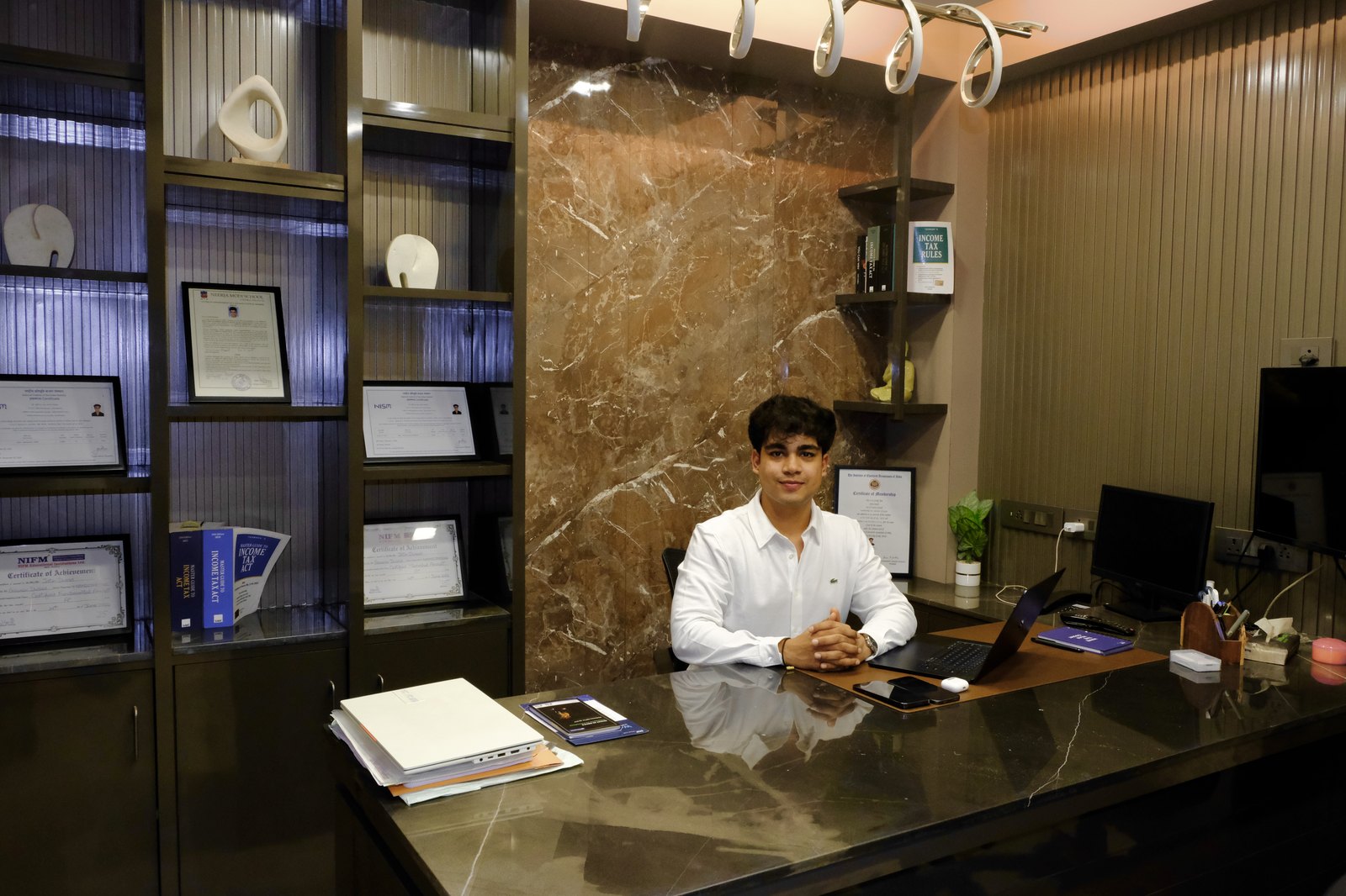 Jatin Dusad at his desk in the NIVO Wealth office, Jaipur